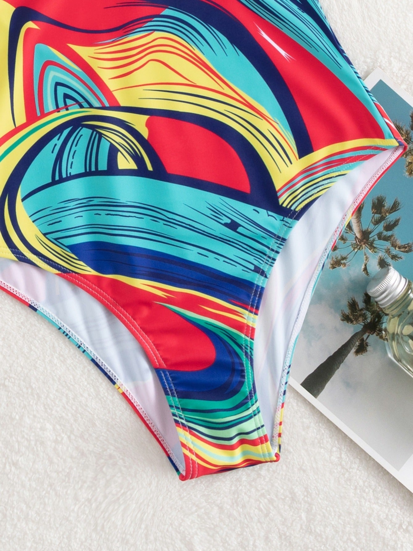 Colorful Fluid Print One Piece Swimsuit Golden Stitching Crochet Trim Deep V Bathing Suit